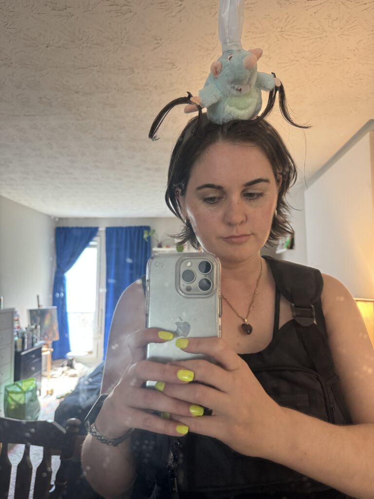 girl with a rat chef on her head